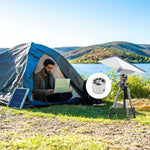 Load image into Gallery viewer, Man working on laptop at lakeside campsite using Starlink Mini Tripod Mount Adapter with solar-powered satellite internet setup.